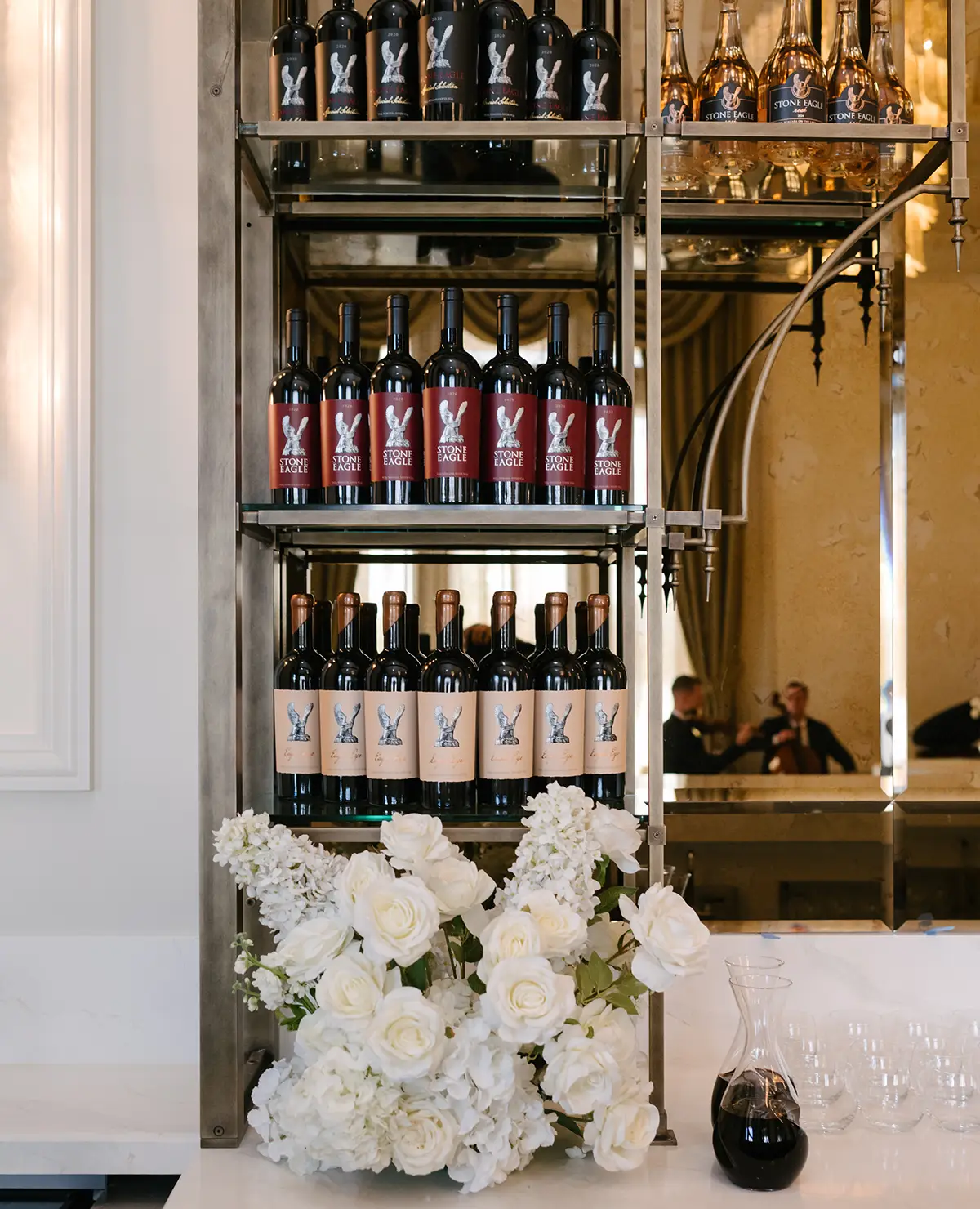Wines and a wedding bouquet in the Pluma room at Stone Eagle winery.