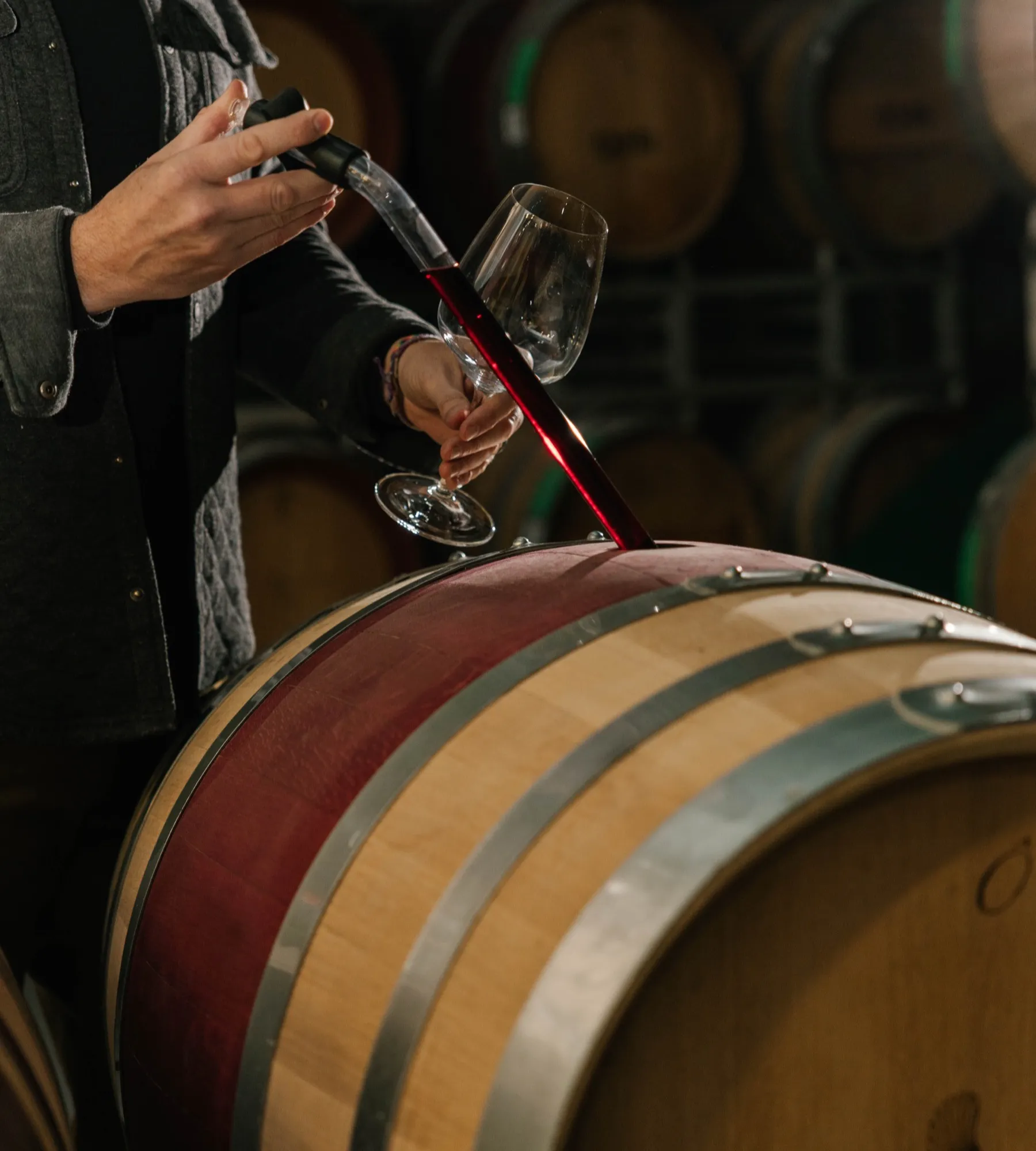 Wine being drawn from a barrel in the Stone Eagle Grand Cellar